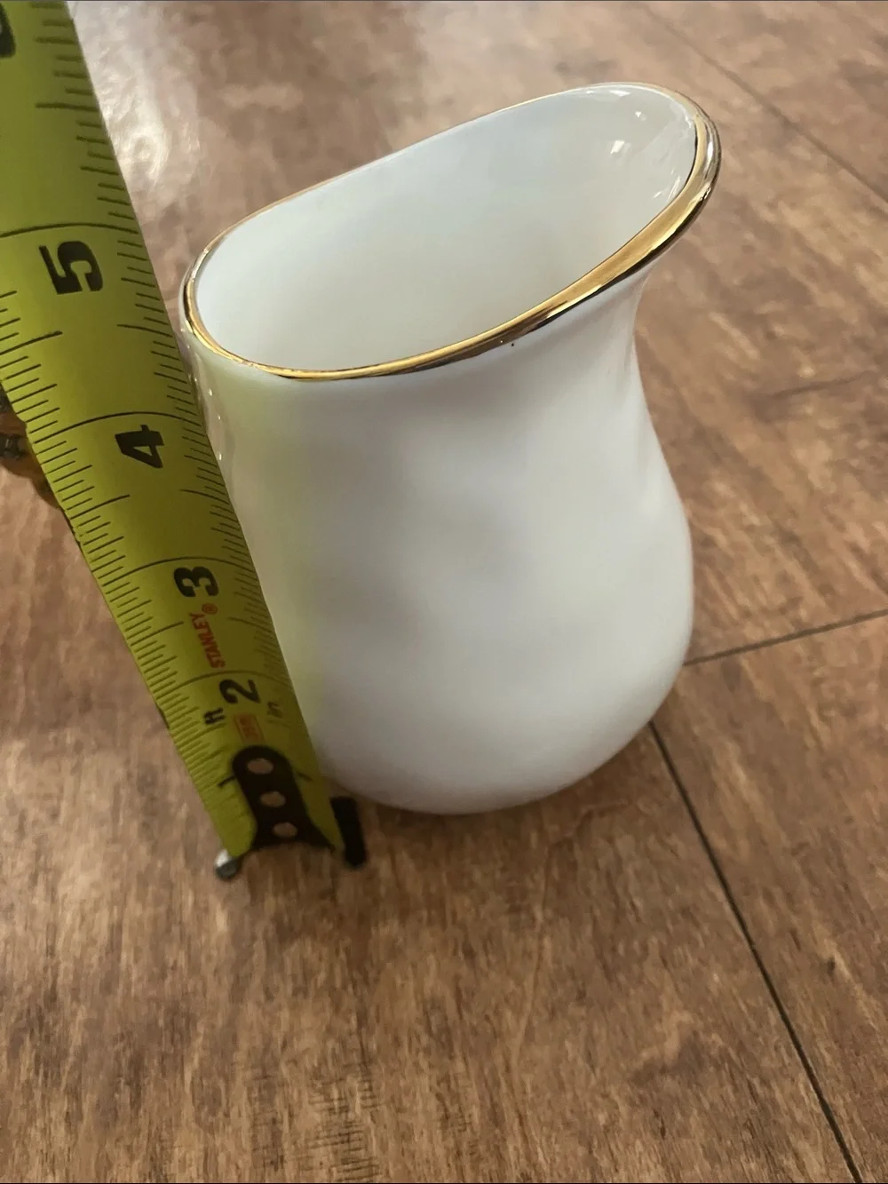White Ceramic Creamer Pitcher with Gold Accent Handle